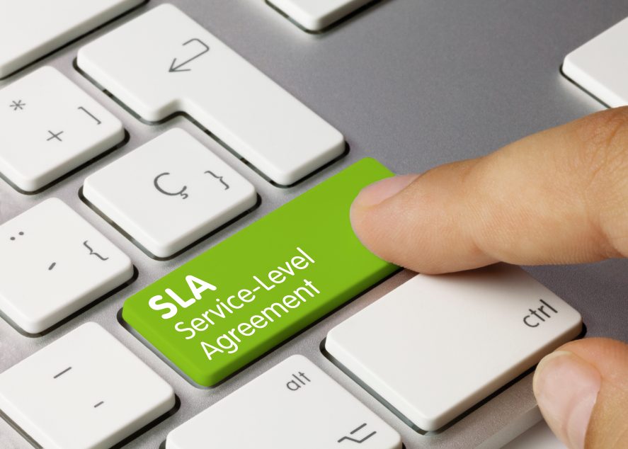 Image of a keyboard with a green button stating SLA Service Level Agreement
