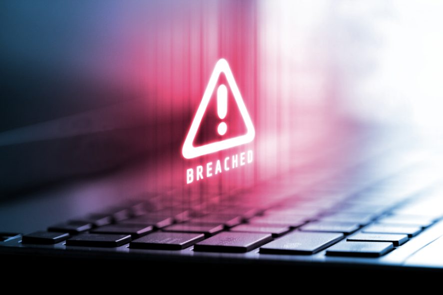 Rendering of alert logo on laptop computer.