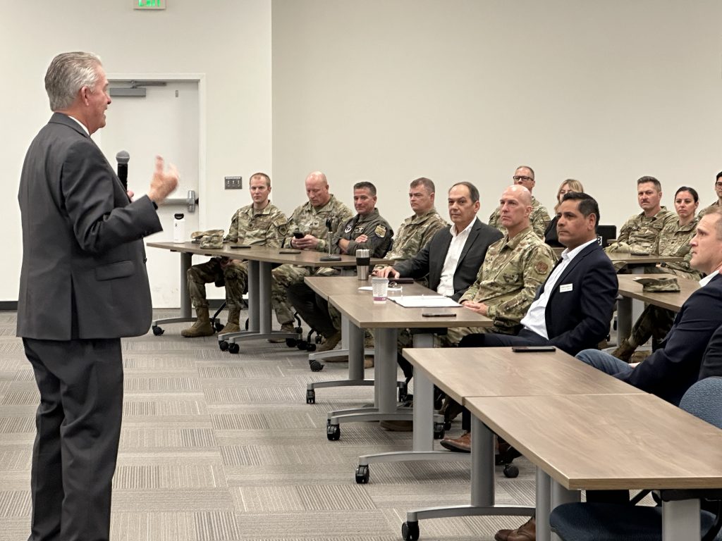 Governor little speaking to ITS staff members and National Guard partner members 