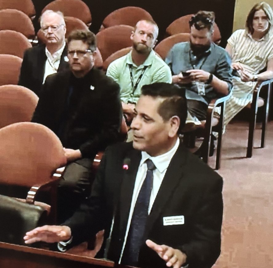 Alberto Gonzalez, ITS CIO, speaking to members of Idaho's legislature on the topic of AI framework