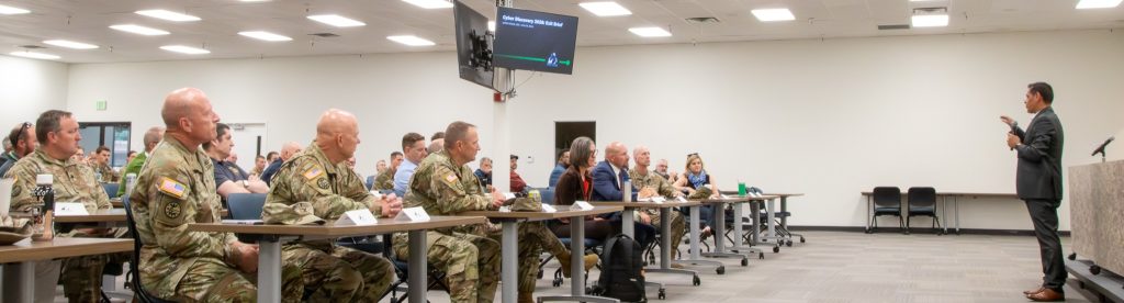 ITS Director Alberto Gonzalez speaking to national guard and participants for Cyber Discovery 2026