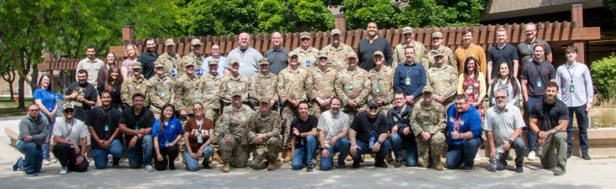 Group photo of national guard and participants for Cyber Discovery 2026